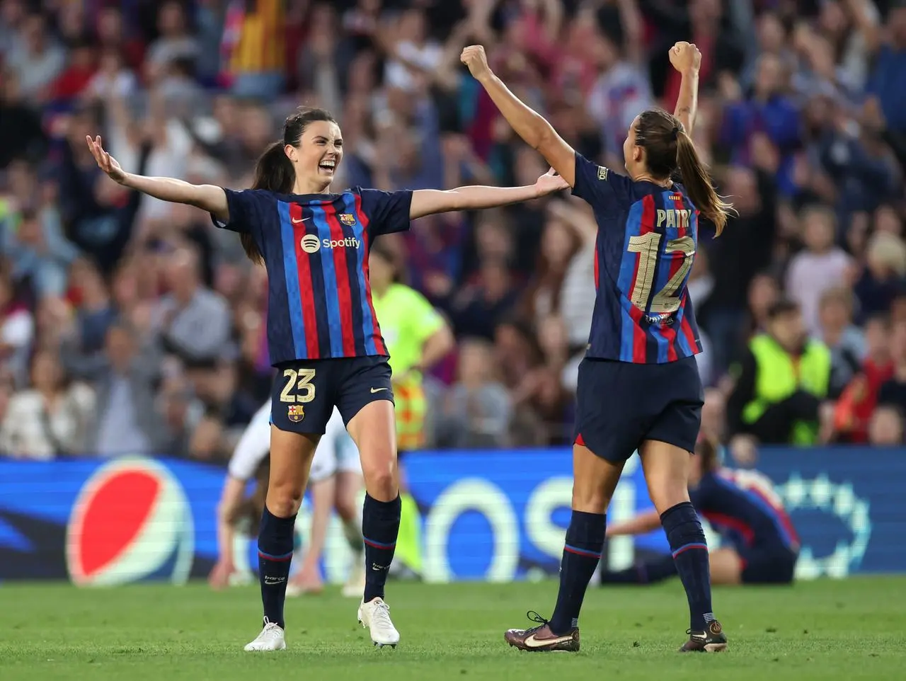 Barcelona’s Ingrid Syrstad Engen (left) and Patricia Guijarro celebrate reaching the Champions League final 