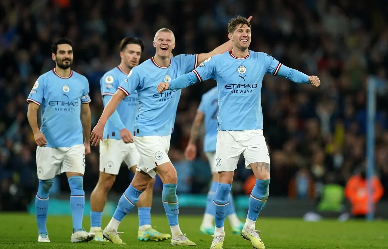 John Stones celebrates scoring against Arsenal