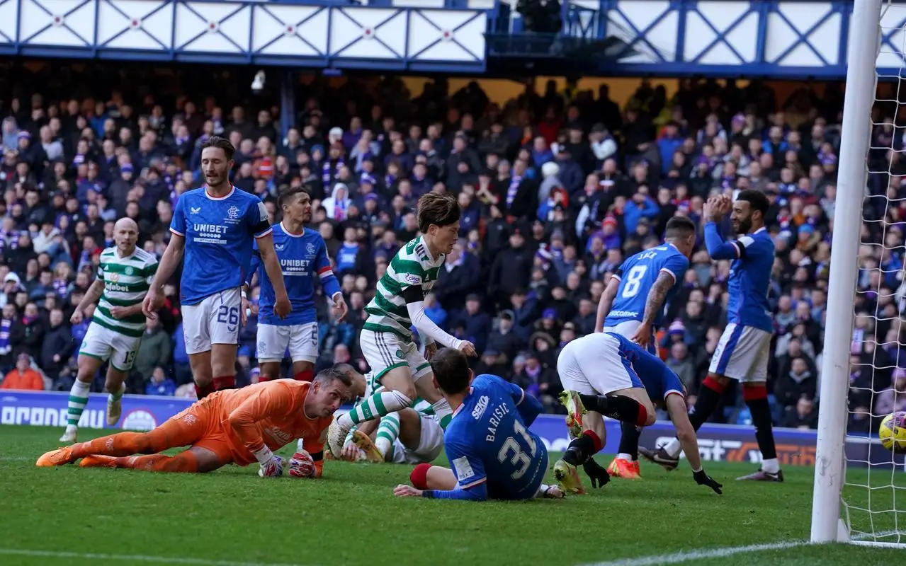 Kyogo Furuhashi, centre, scores for Celtic in their cinch Premiership draw with Rangers