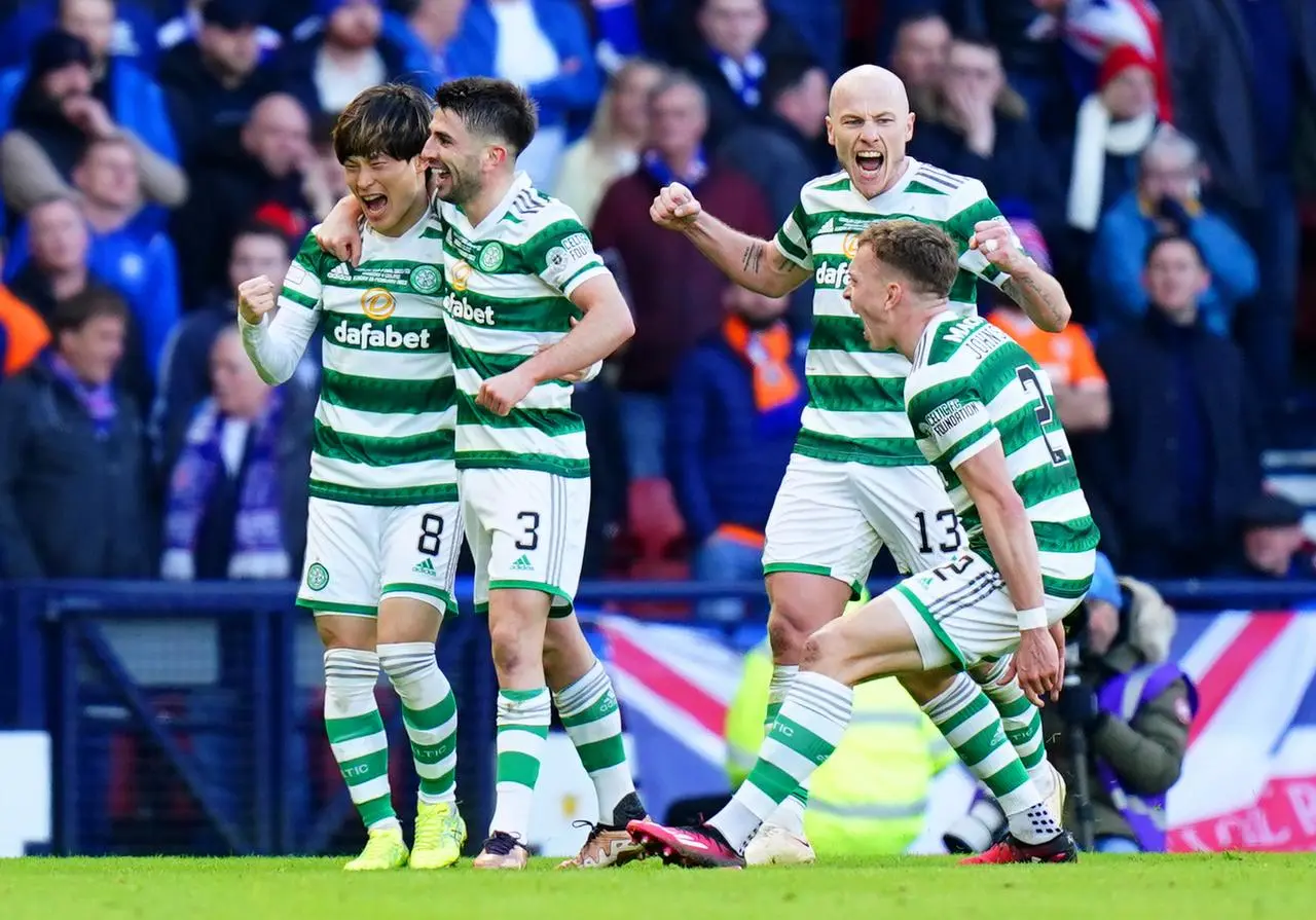 Kyogo Furuhashi, left, and Celtic celebrate their opening goal in the Viaplay Cup final