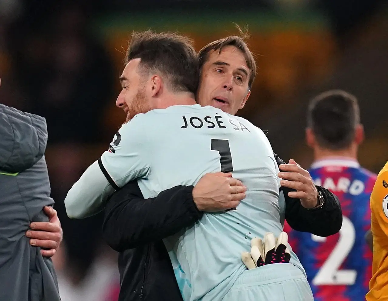 Julen Lopetegui congratulates Wolves keeper Jose Sa, left, after the game