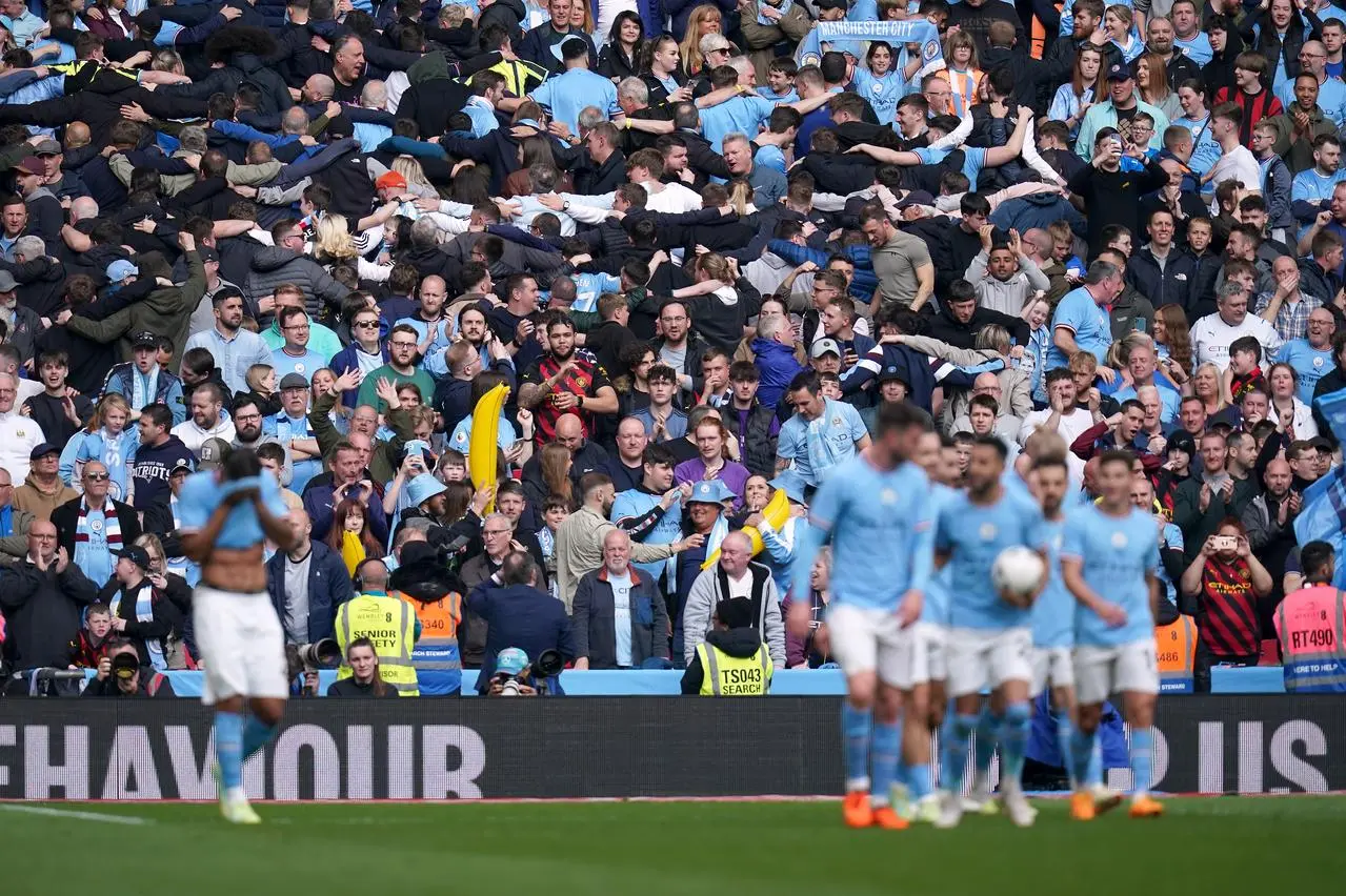 Manchester City fans celebrate