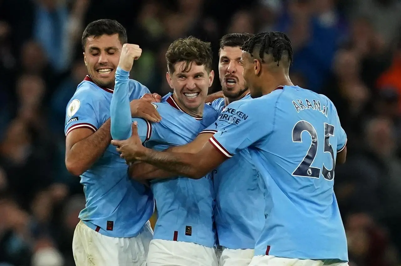 Manchester City celebrate scoring against Arsenal