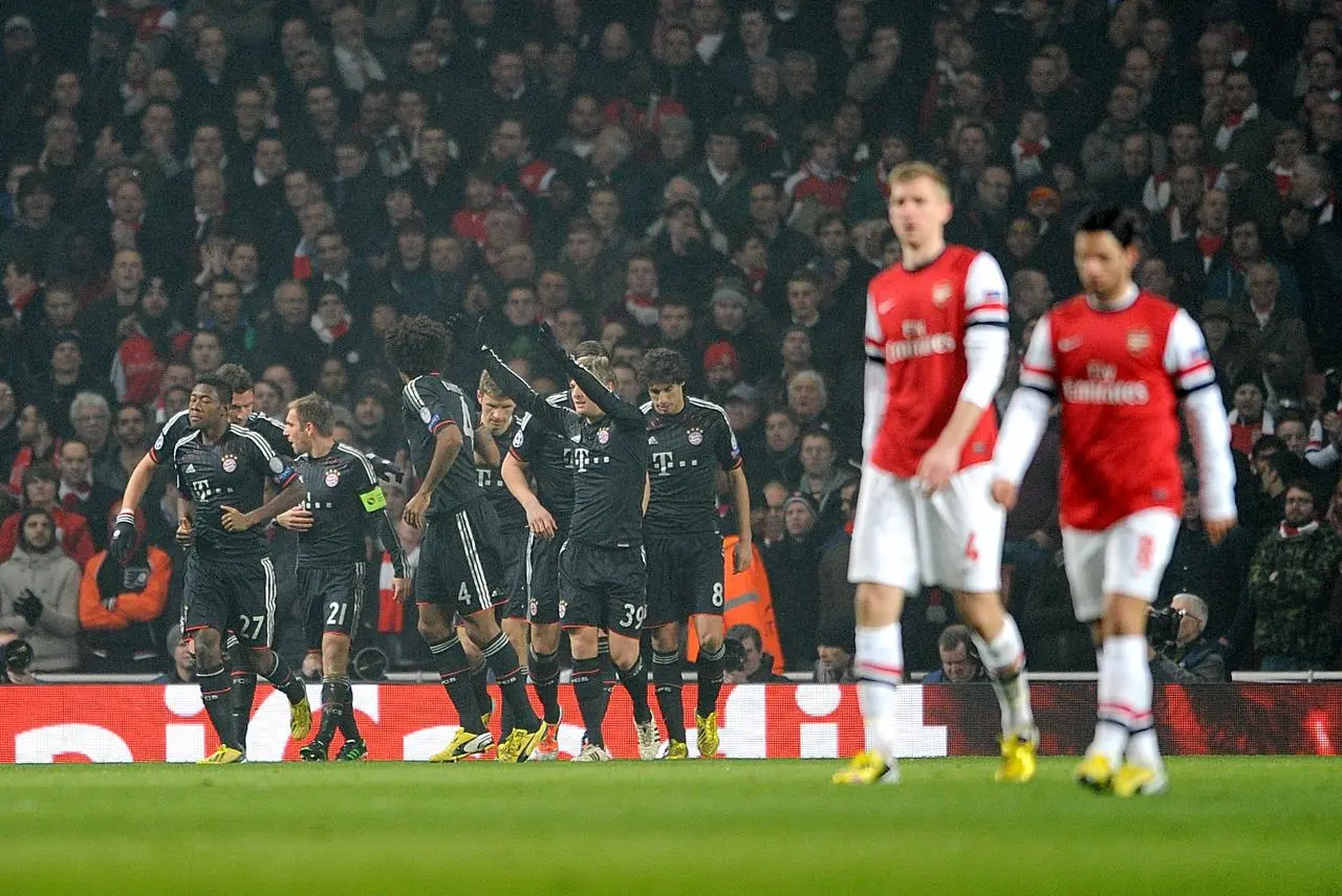 Arsenal’s Mikel Arteta (right) and Per Mertesacker were unable to help the Gunners beat the best in Europe.