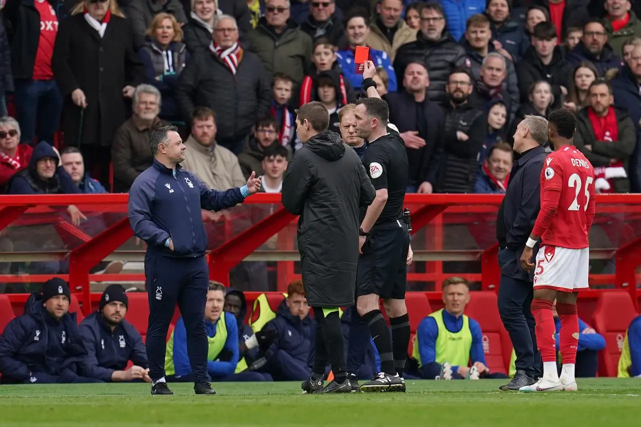 Alan Tate (centre) is shown a red card by referee Chris Kavanagh