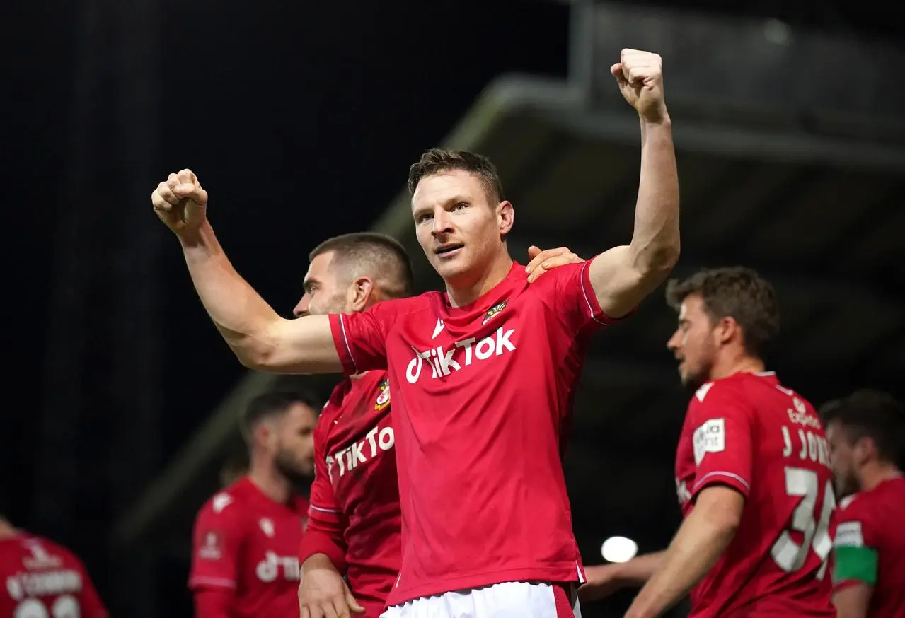 Paul Mullin celebrates an FA Cup goal against Sheffield United