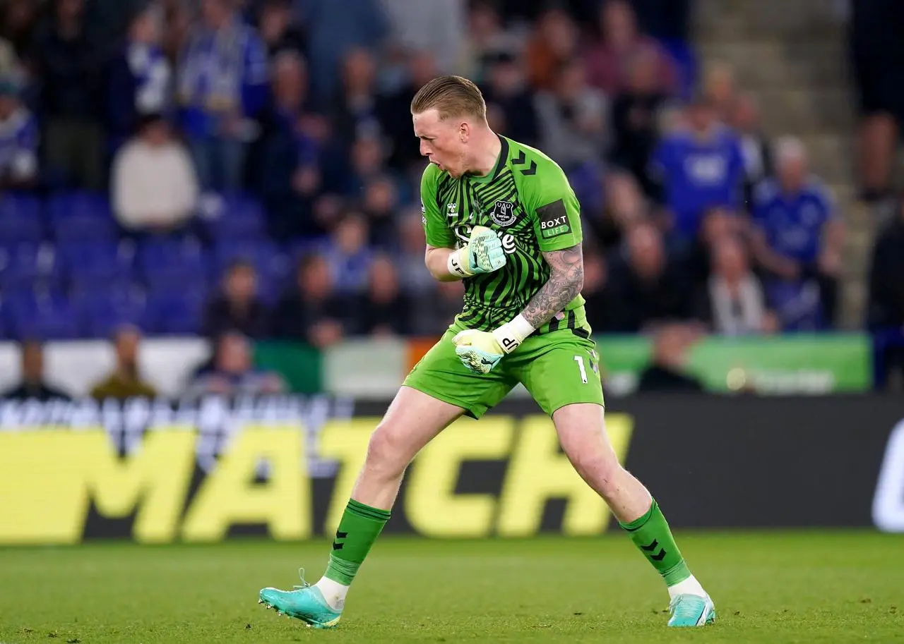 Jordan Pickford celebrates after saving a penalty