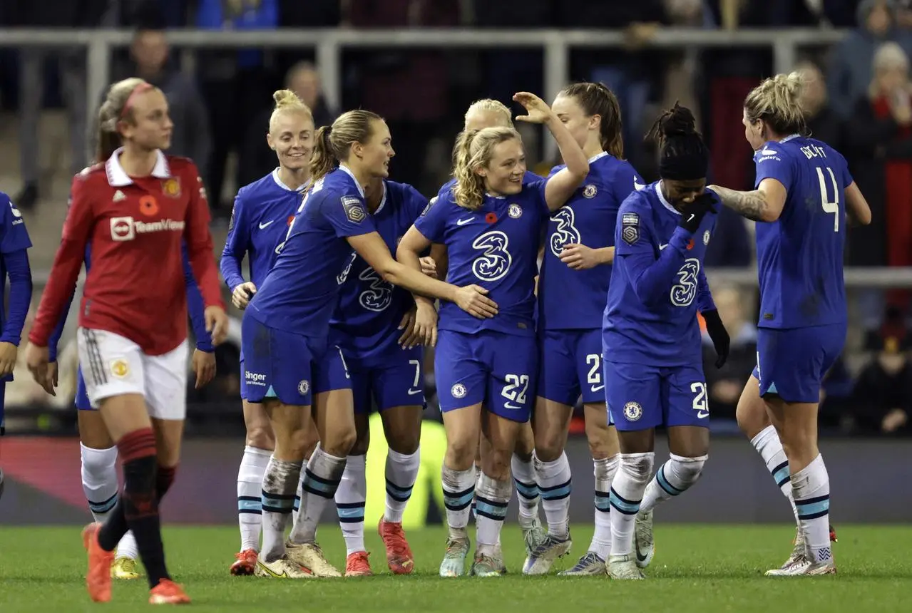 Erin Cuthbert (centre) celebrates scoring Chelsea's third goal 