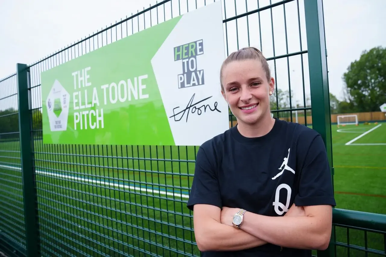 Toone at the unveiling of a pitch named after her in Wigan 