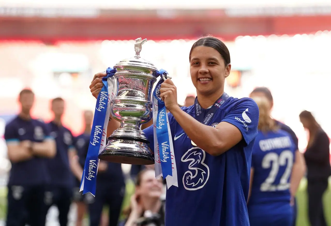 Sam Kerr lifts the FA Cup