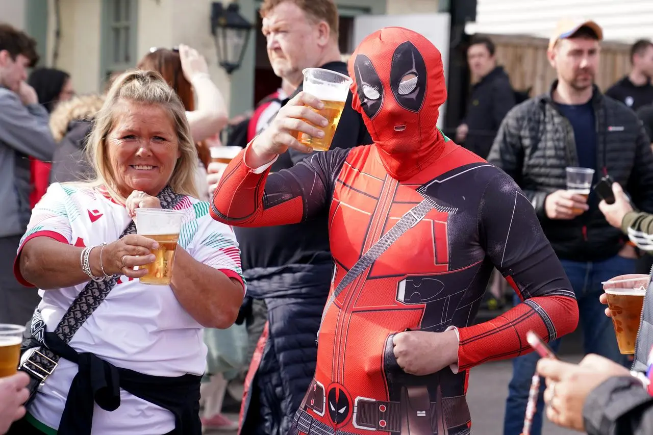 A fan in Deadpool fancy dress