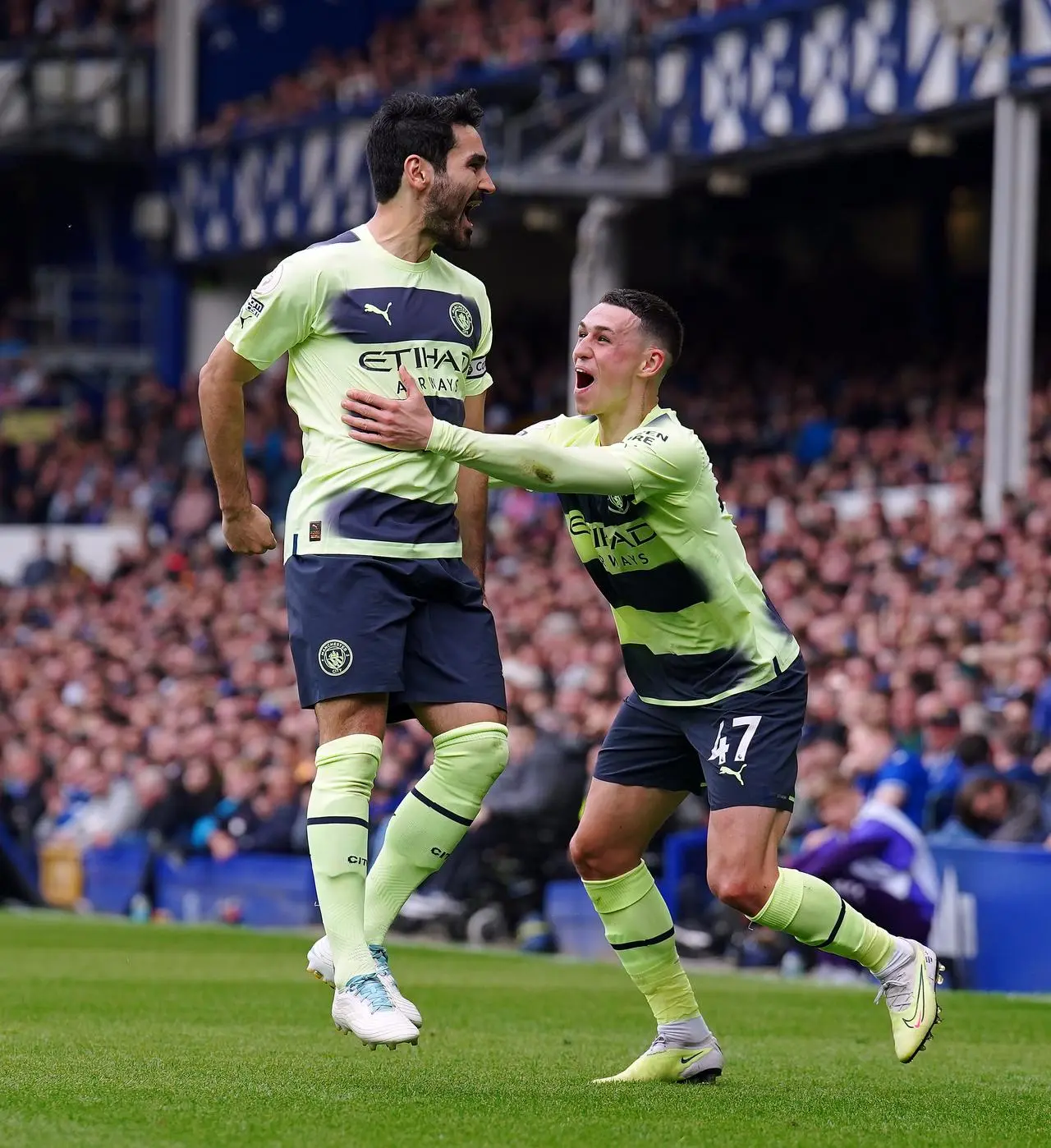 Ilkay Gundogan and Phil Foden celebrate Manchester City's third 