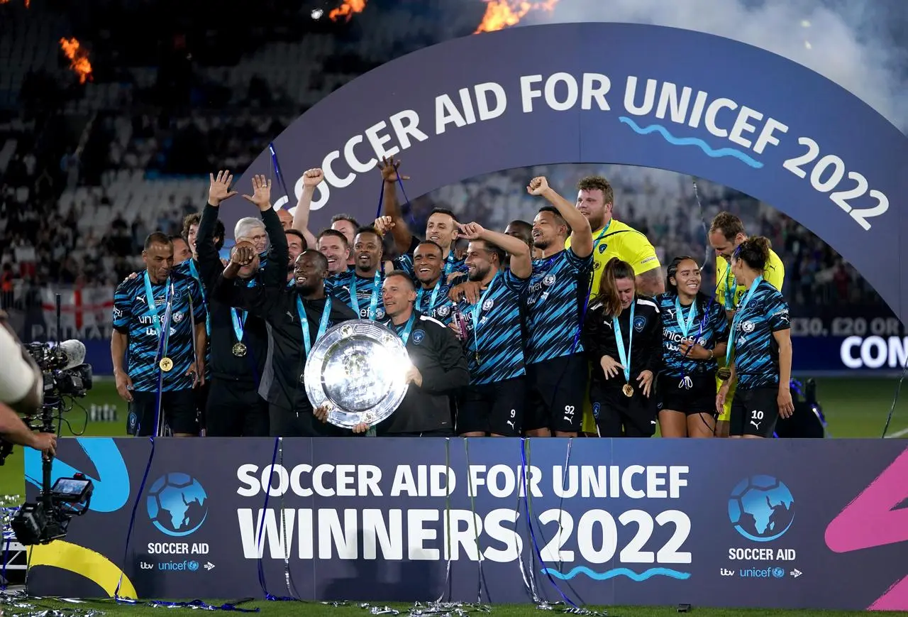 The Rest of the World XI celebrated victory in the 2022 Soccer Aid match at the London Stadium 