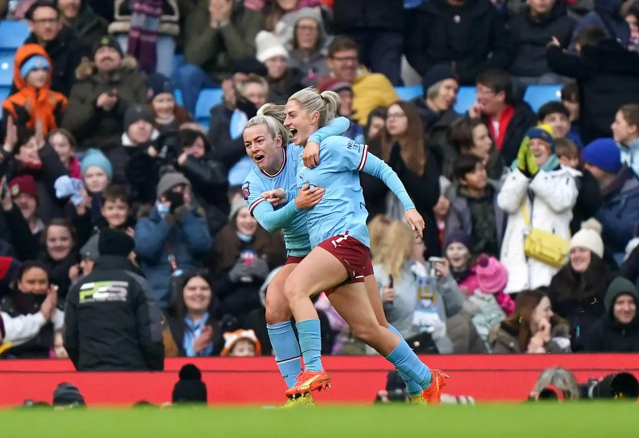 Coombs (right) celebrates after scoring Manchester City’s equaliser in the 1-1 draw with Manchester United at the Etihad Stadium in December 