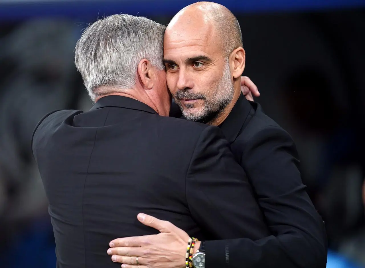 Manchester City boss Pep Guardiola, right, and Real Madrid manager Carlo Ancelotti