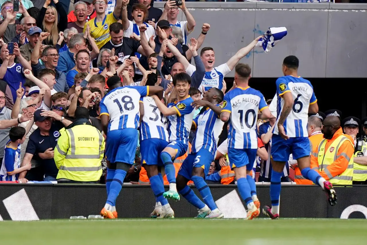 Brighton’s Pervis Estupinan celebrates the final goal at Arsenal 