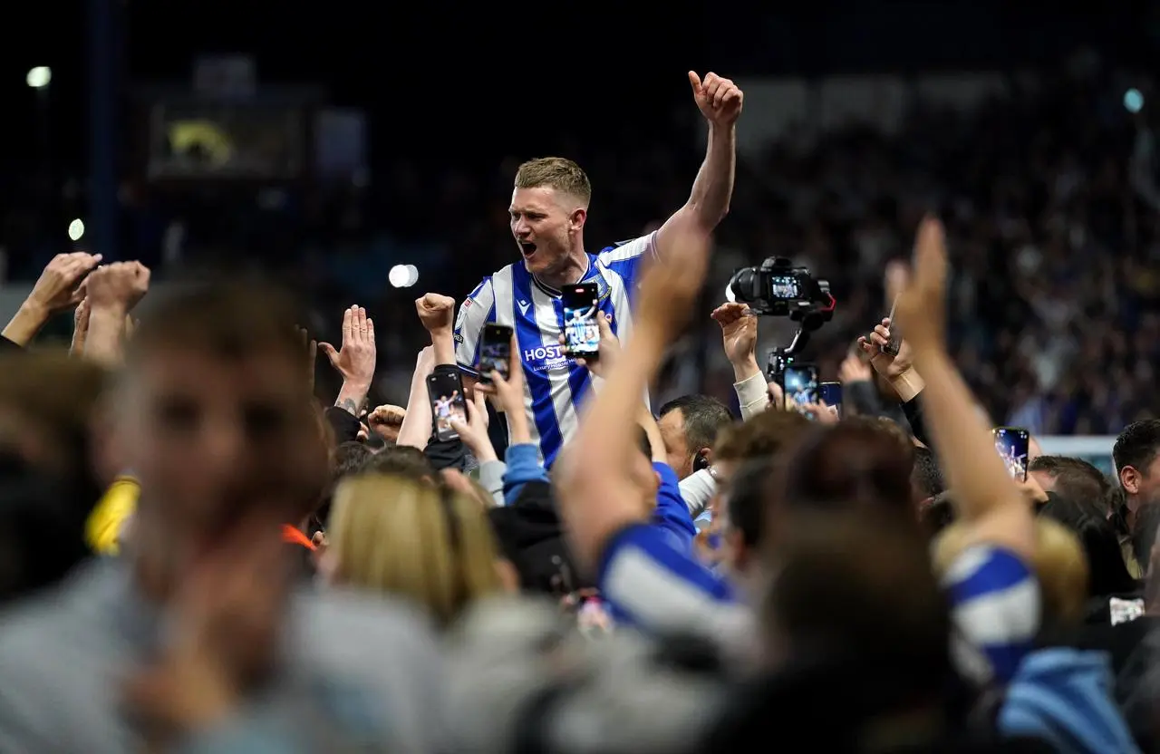 Sheffield Wednesday’s Michael Smith celebrates with fans after the Sky Bet League One play-off semi-final second leg match 