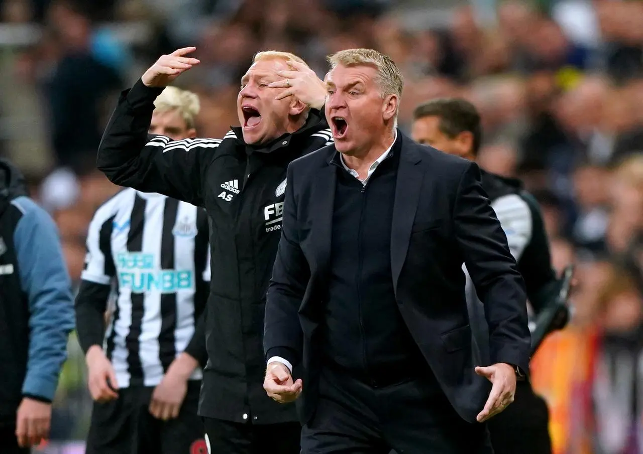 Leicester boss Dean Smith (right) defended his team selection