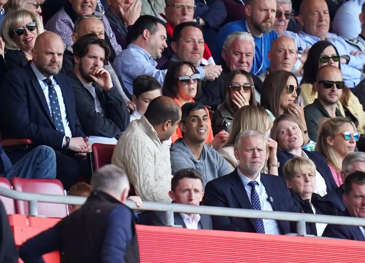 Prime minister Rishi Sunak (centre) watches Southampton go down