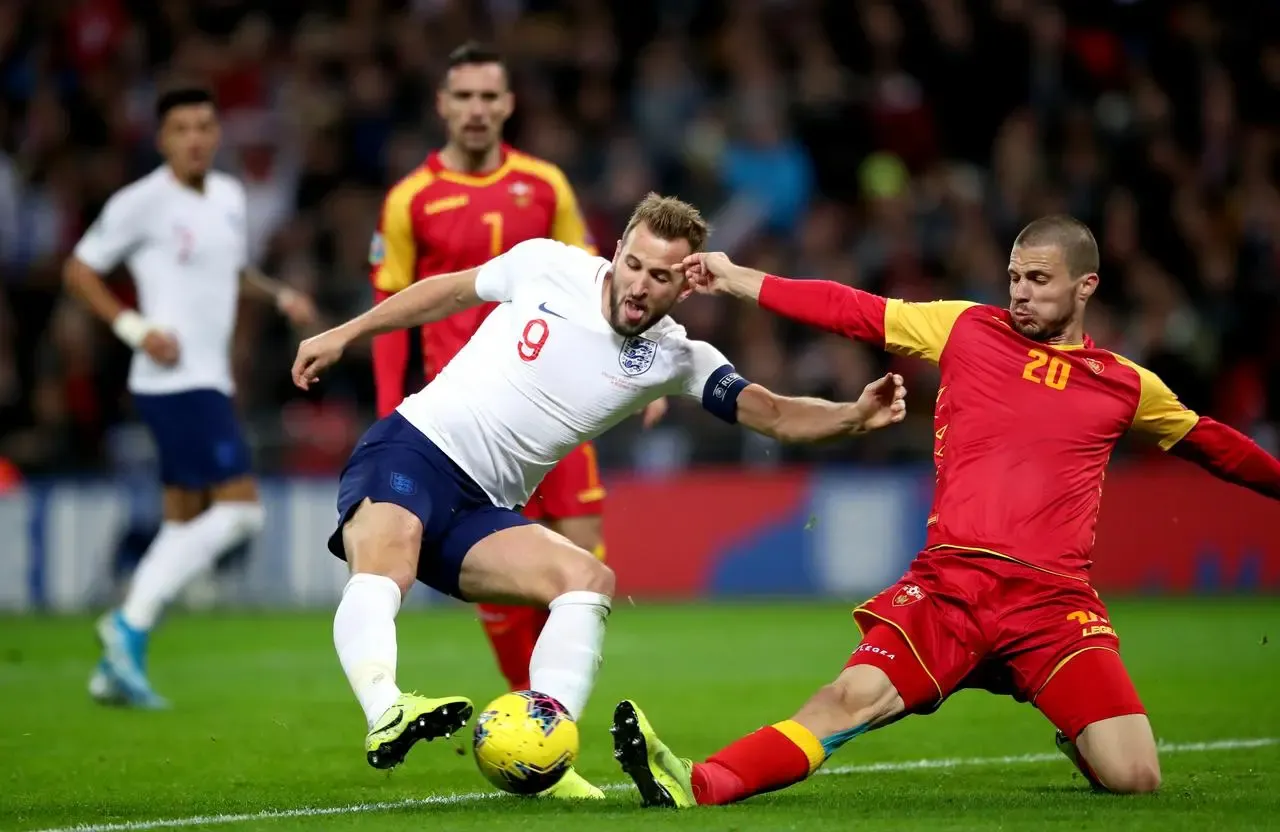 Harry Kane scores against Montenegro