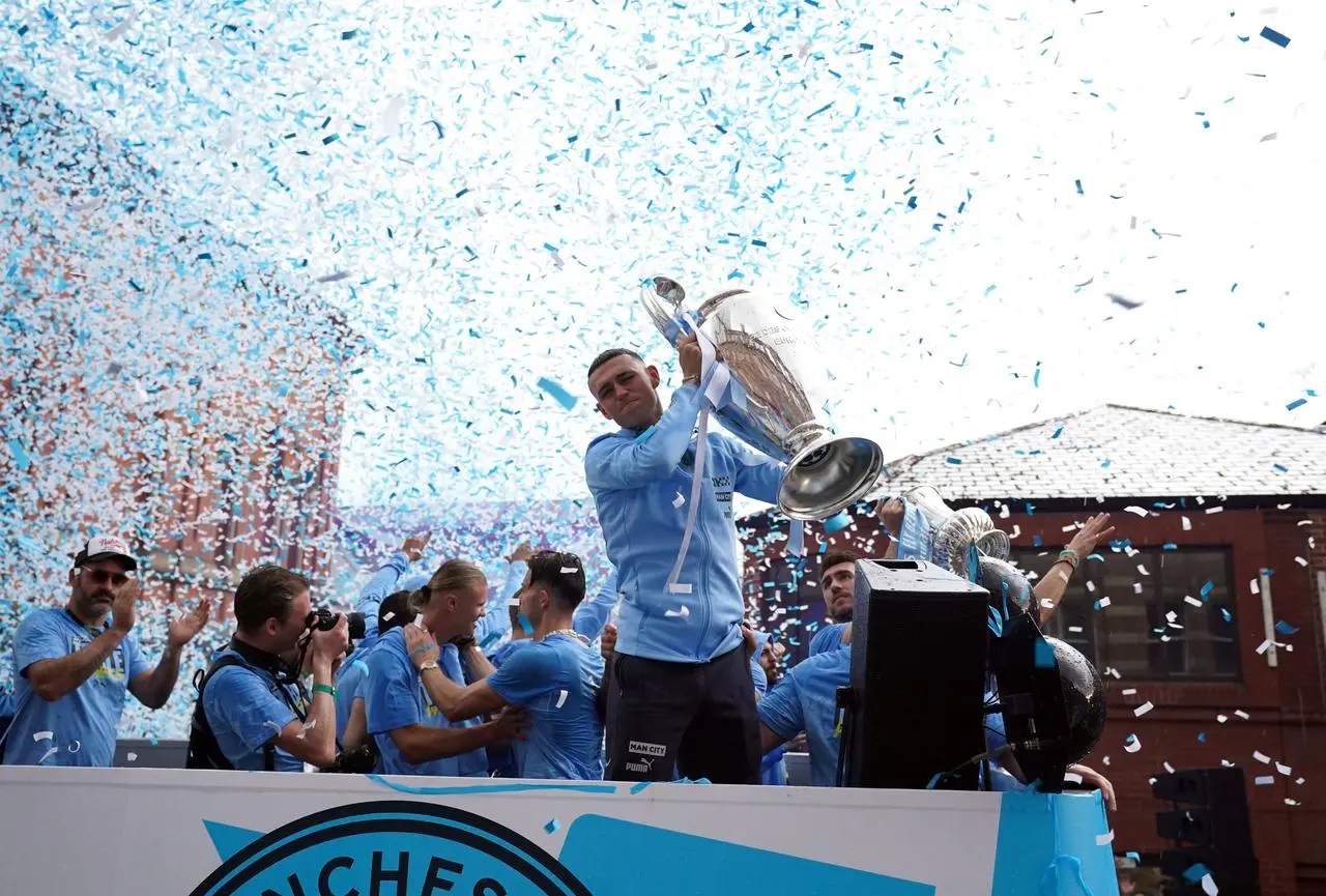 Manchester City’s Phil Foden with the Champions League trophy