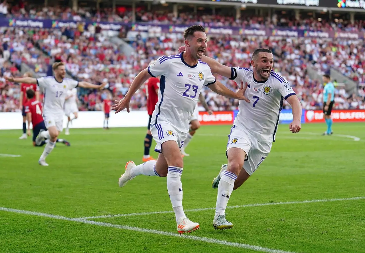 Kenny McLean (left) celebrates