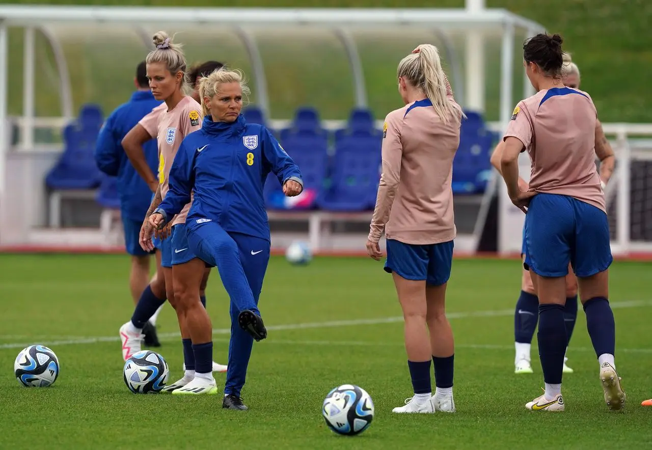 Wiegman with players during a training session at St George's Park (Martin Rickett/PA)