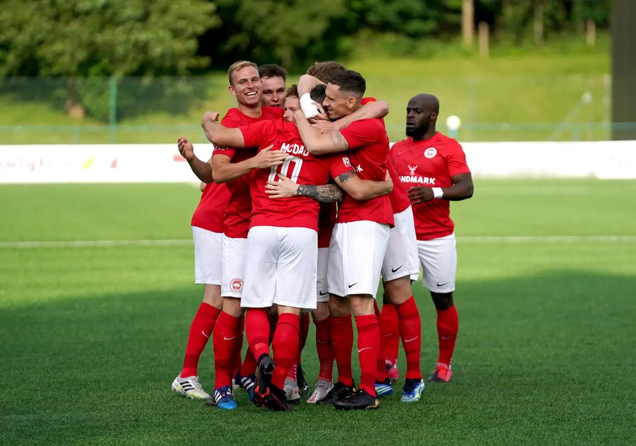 Mark Randall, second right, celebrates Larne scoring against Welsh club Bala Town in Europa Conference League qualifying in 2021