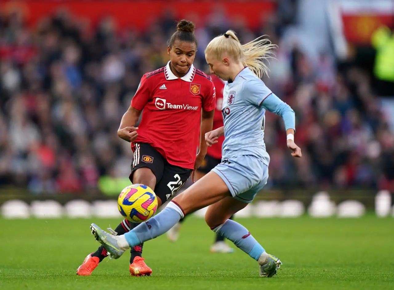 Manchester United’s Nikita Parris (left) and Aston Villa’s Laura Blindkilde in action (Tim Goode/PA)