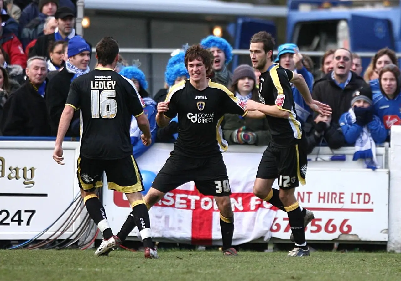 Aaron Ramsey, centre, celebrates an FA Cup goal for Cardiff as an 18-year-old