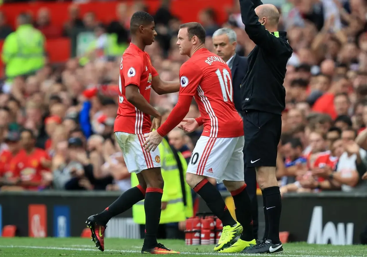 Wayne Rooney, centre, replaces Marcus Rashford, left, in Manchester United’s 2016 Premier League match against Leicester