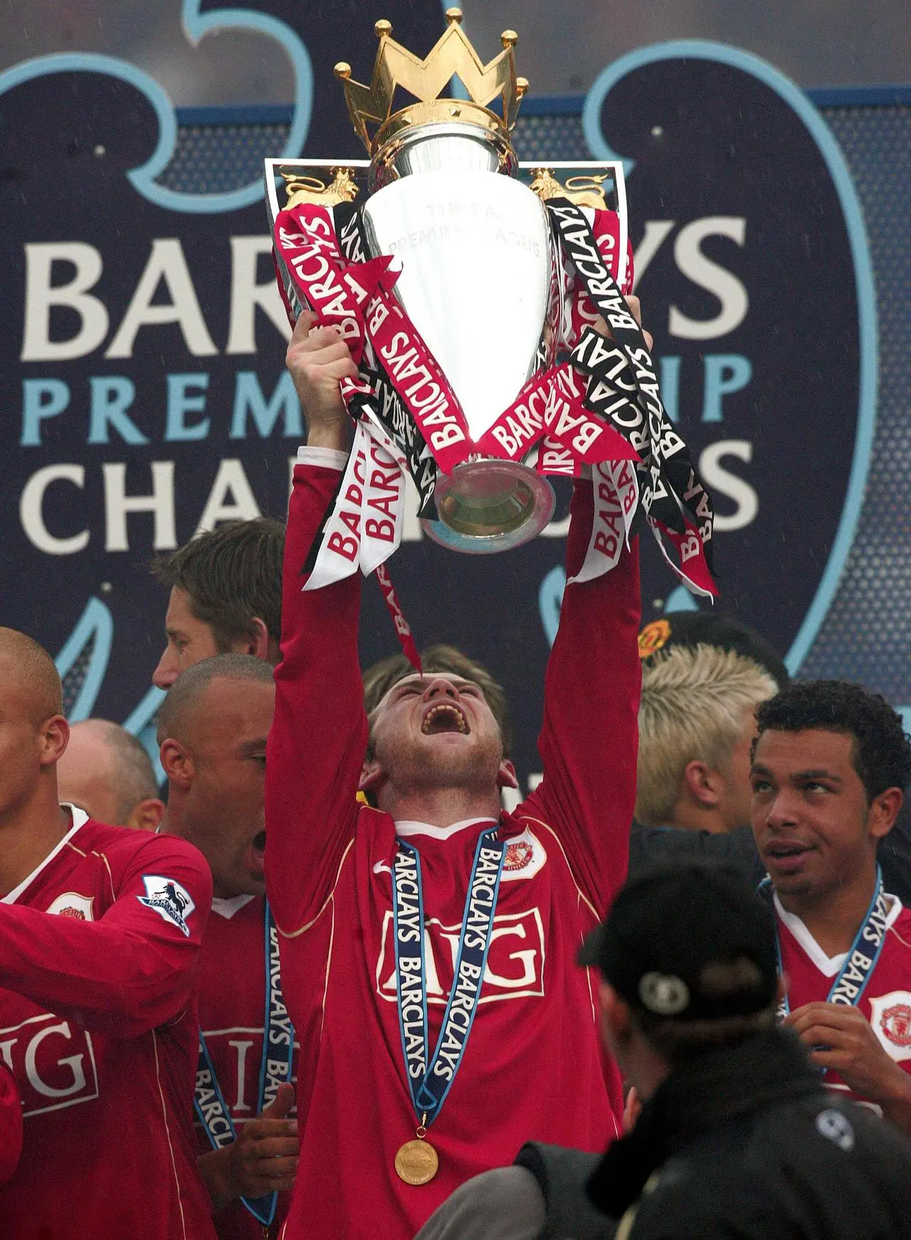 Wayne Rooney lifts the Premier League trophy with Manchester United in 2008