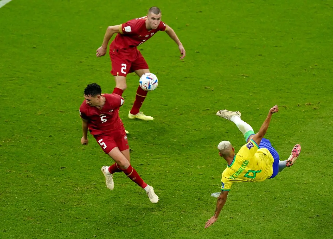 Richarlison, right, scores for Brazil with a scissor-kick against Serbia at the World Cup