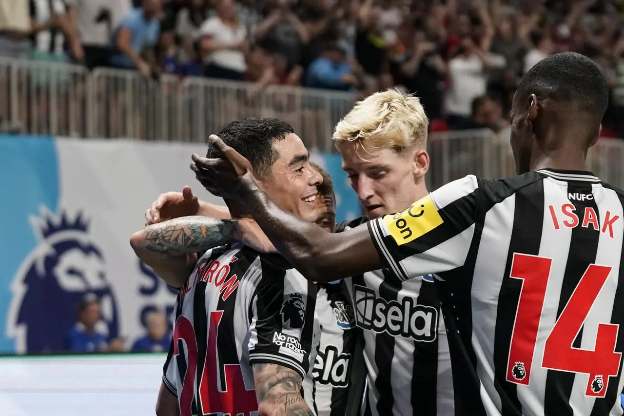 Newcastle's Miguel Almiron (left) celebrates