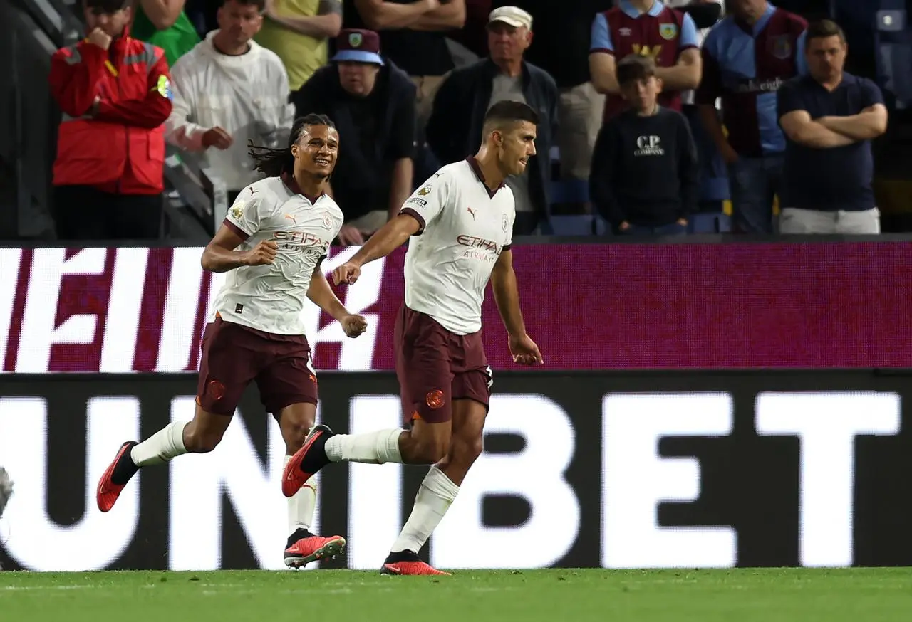 Rodri (right) celebrates scoring Manchester City's third 