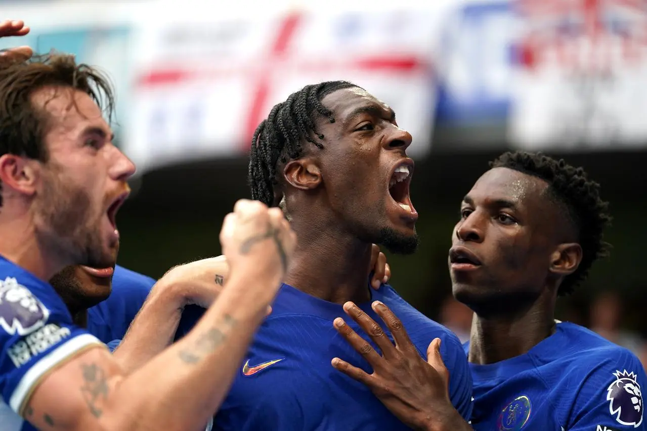 Axel Disasi, centre, celebrates after scoring Chelsea’s equaliser