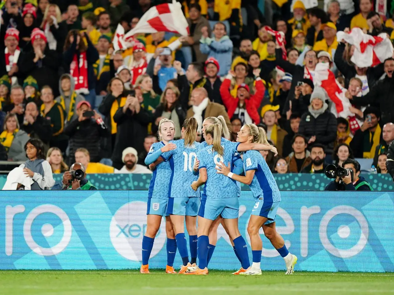 England celebrate Lauren Hemp's strike