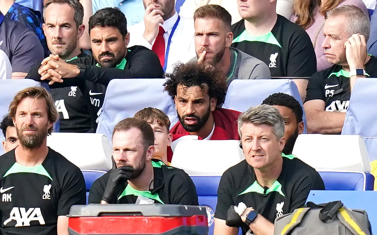 Mohamed Salah (centre) looks frustrated after being substituted 