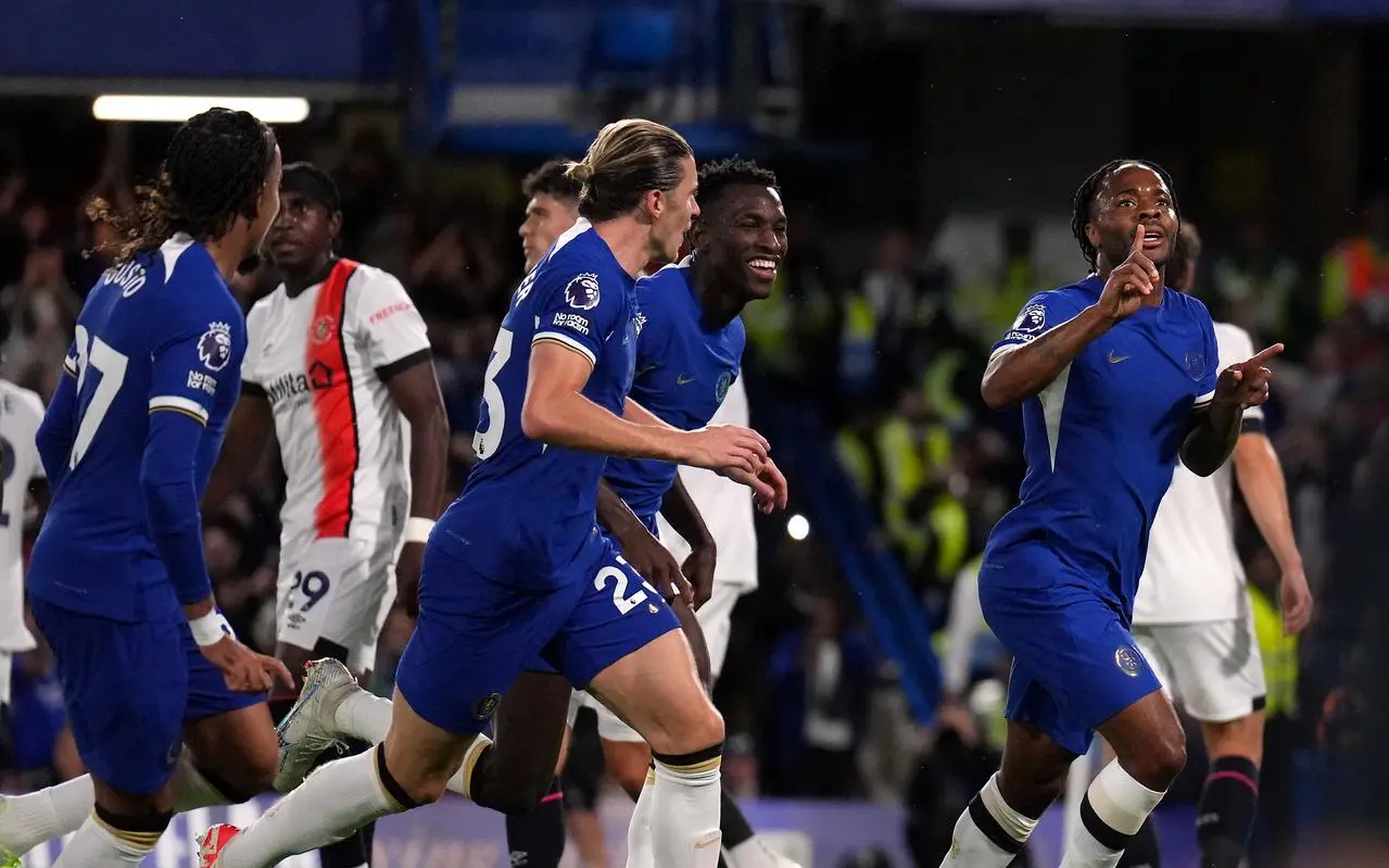 Raheem Sterling, right, celebrates after scoring Chelsea’s first goal