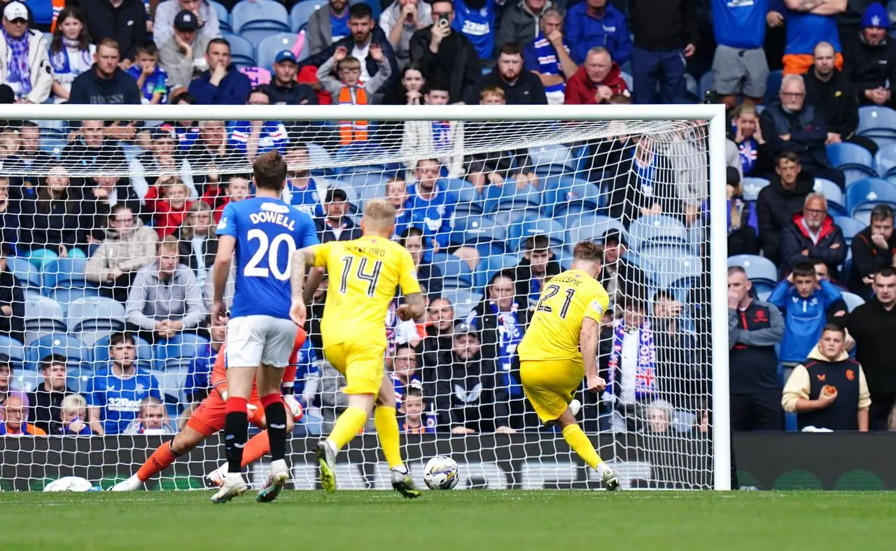 Grant Gillespie scores his penalty