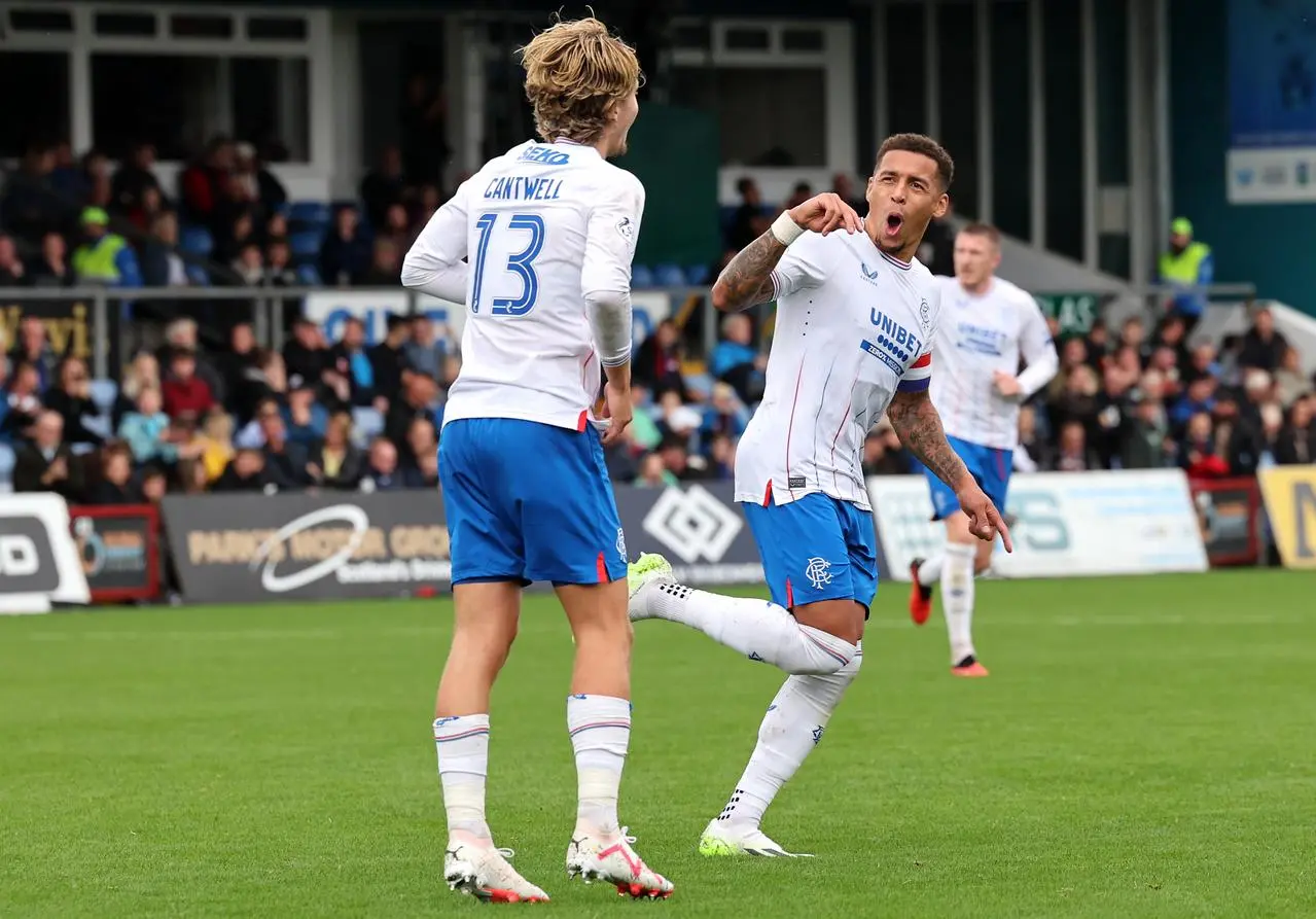 James Tavernier, right, celebrates with Todd Cantwell after scoring Rangers’ second goal at Ross County