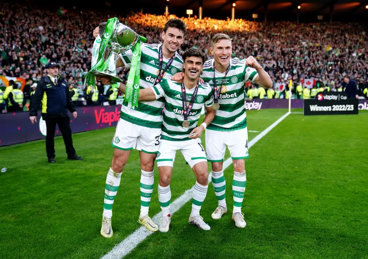 Jota, centre, and Carl Starfelt, right