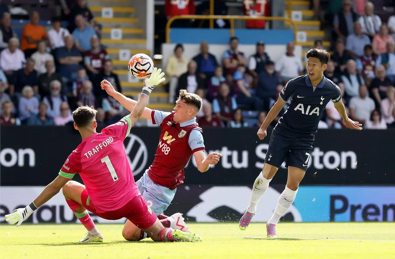 Son Heung-min, right, scores Tottenham's equaliser