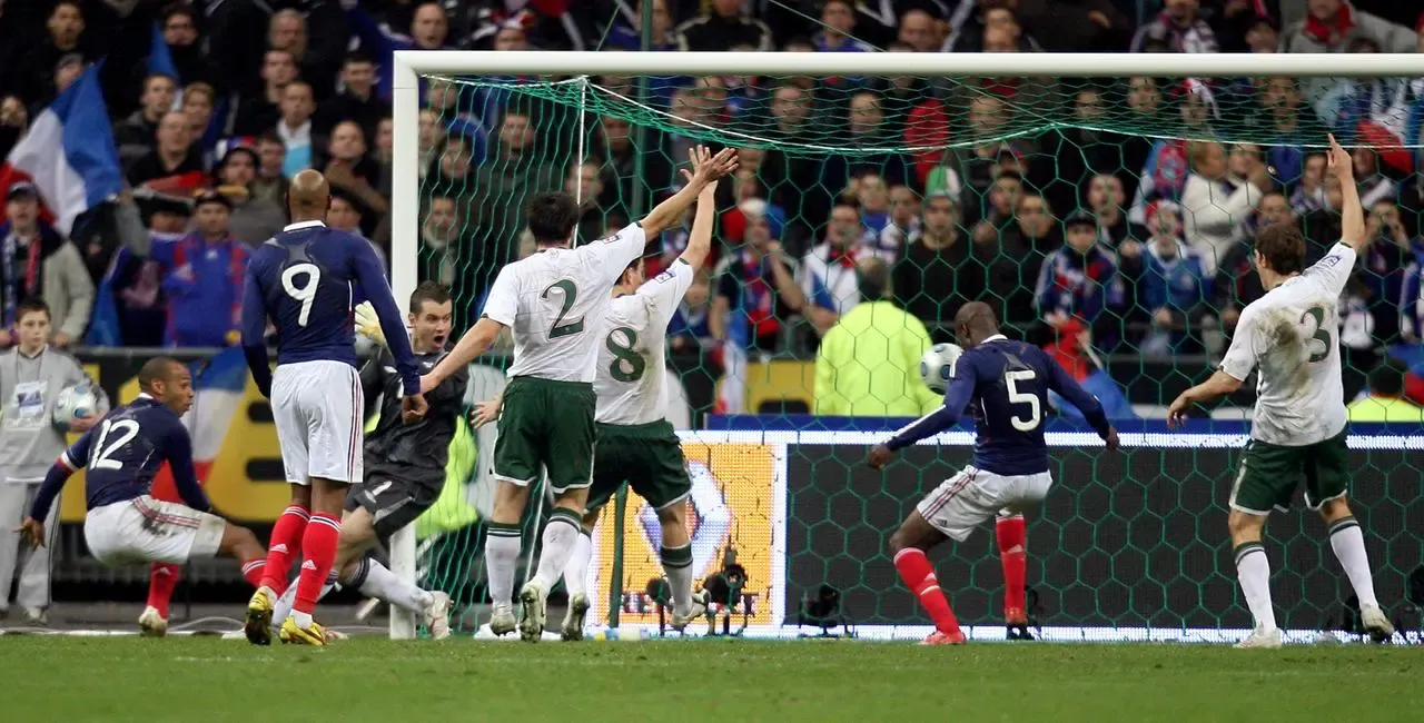 France’s William Gallas (second right) scores after being set up by Thierry Henry (left) as the Republic of Ireland appeal in vain for handball