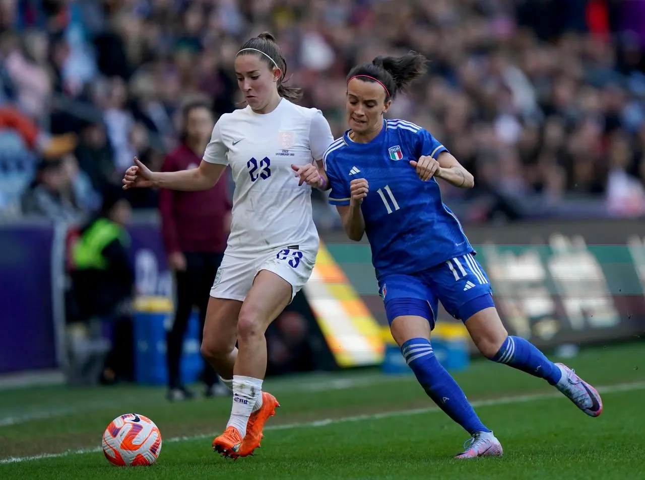 Le Tissier and Italy’s Barbara Bonansea battle for the ball (Tim Goode/PA)