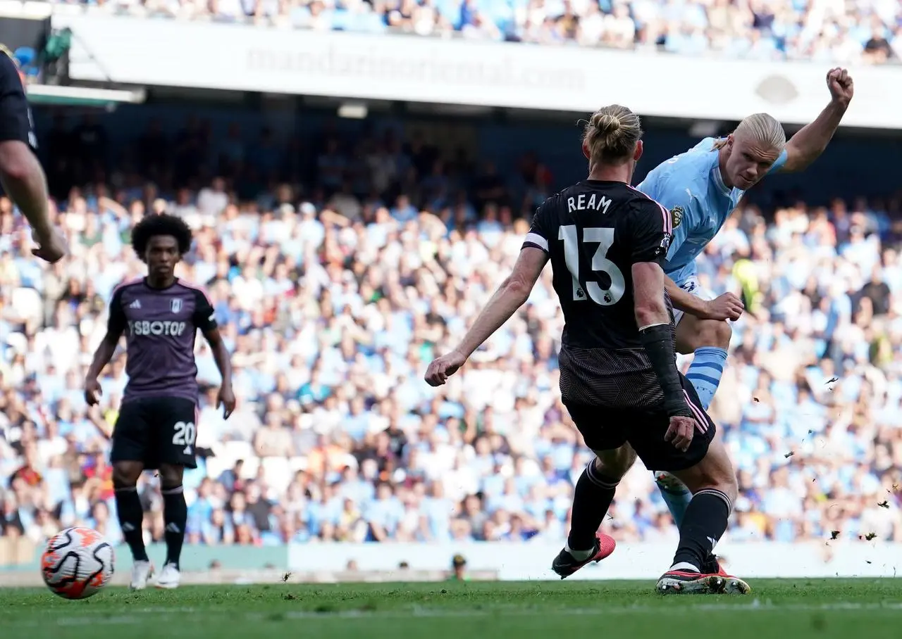 Haaland completes his treble against Fulham (Martin Rickett/PA)