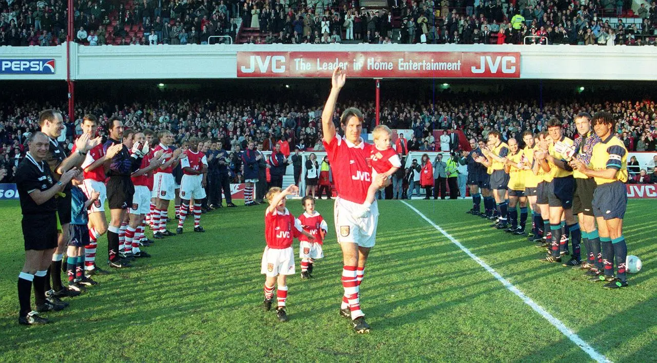 Paul Merson is given a guard of honour for his benefit match in 1996, in the midst of his two-year run of consecutive league appearances