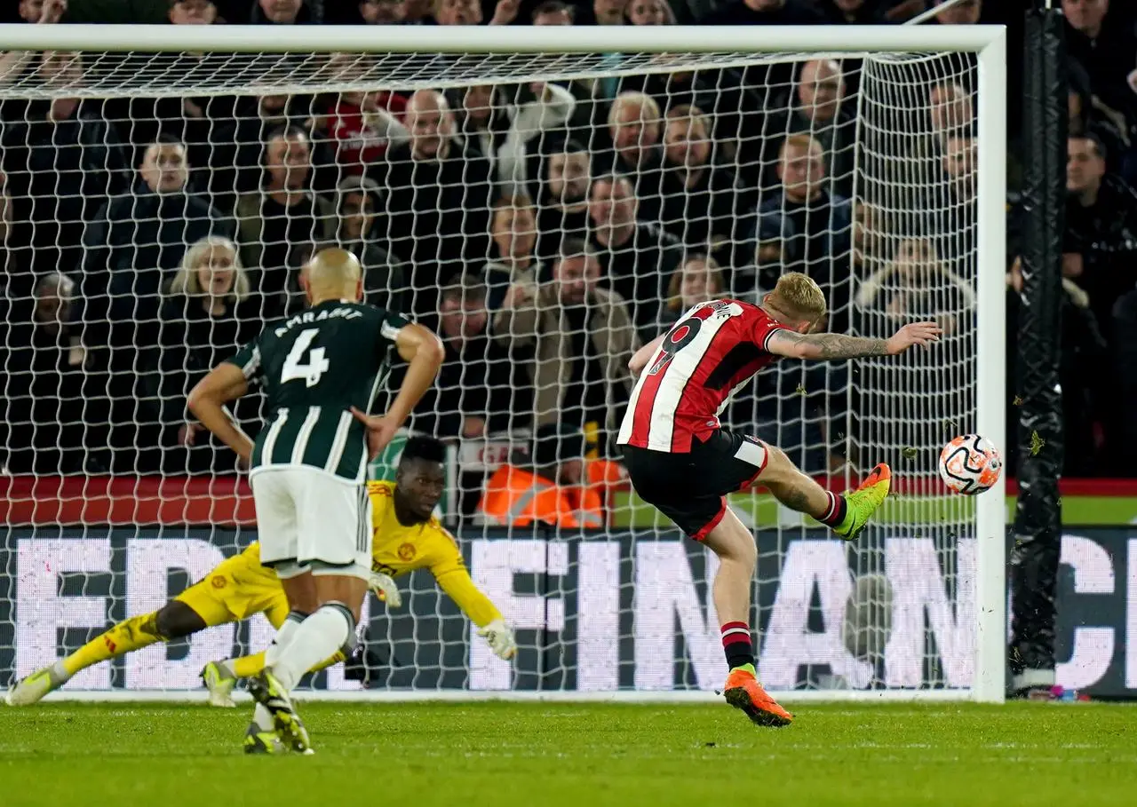 Oli McBurnie equalises from the penalty spot 