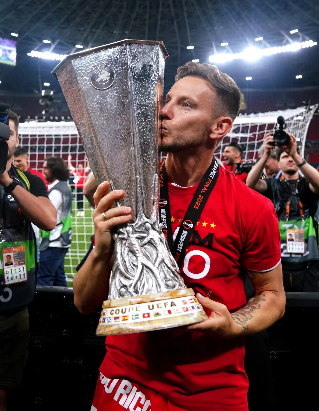 Sevilla’s Ivan Rakitic kisses the Europa League trophy after victory over Roma