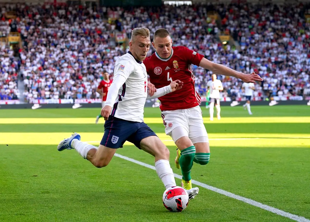 Jarrod Bowen, left, takes on Hungary’s Attila Szalai